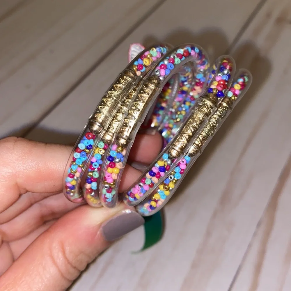 Little girls clear rubber rainbow confetti bracelets